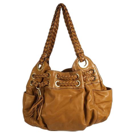 michael michael kors brown leather braided handle and tassel bag